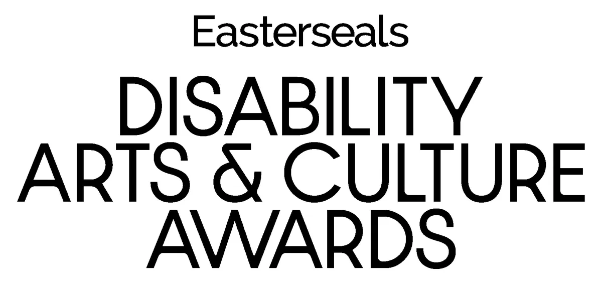 A stage with a spotlight, featuring the Easterseals and HRTS logos for the Darcy Awards.