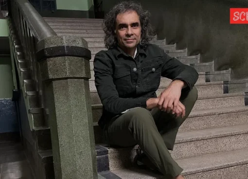 Filmmaker Imtiaz Ali smiling, looking thoughtful.