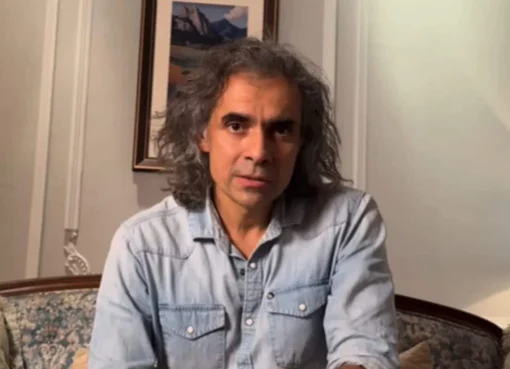 Imtiaz Ali, looking thoughtful and smiling, perhaps imagining his next big film project.