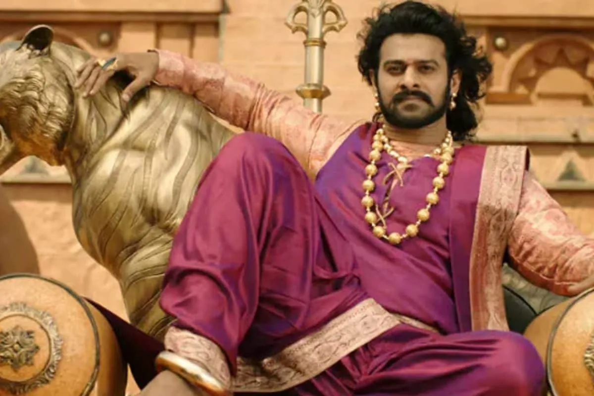 Prabhas looking powerful as a warrior in a royal setting