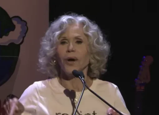 Jane Fonda speaking at a protest event.