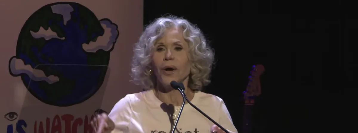 Jane Fonda speaking at a protest event.