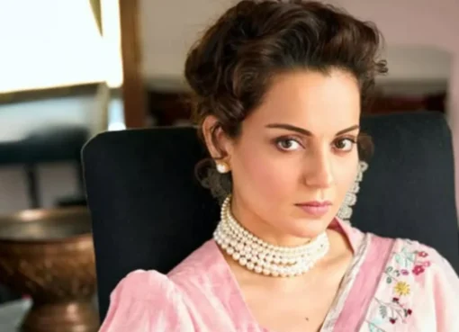 Kangana Ranaut in a light-colored outfit, speaking seriously about her film role.