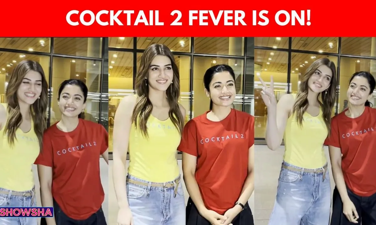 Kriti Sanon in a yellow 'Cocktail 2' top and Rashmika Mandanna in a red 'Cocktail 2' top, smiling at the airport.