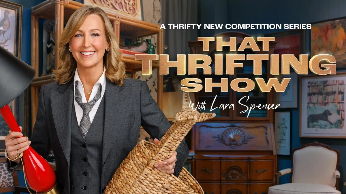 Lara Spencer smiling on a TV show set.