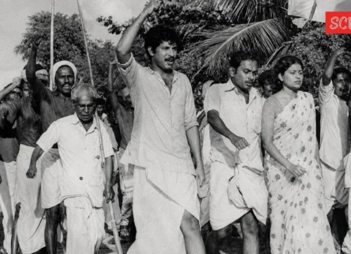 A young Mammootty looking thoughtful, possibly in an early film role.
