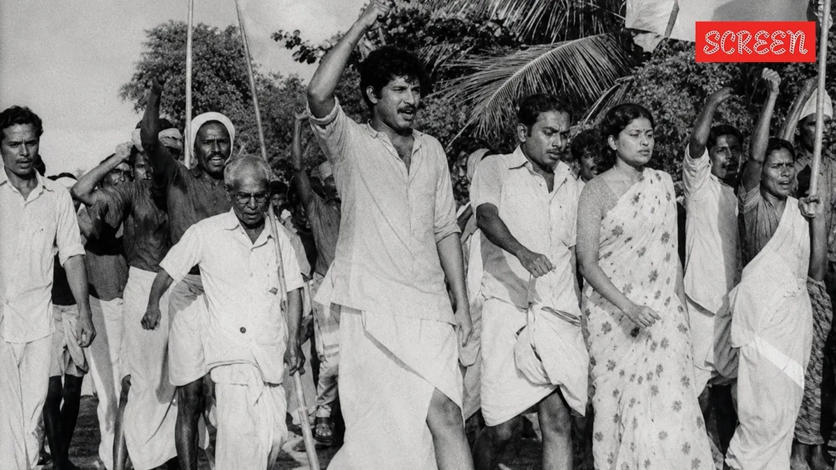 A young Mammootty looking thoughtful, possibly in an early film role.