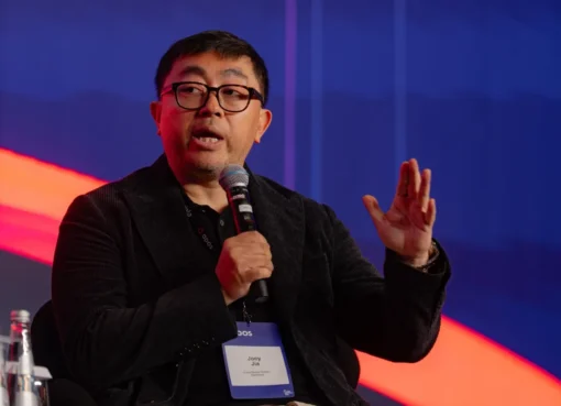 Joey Jia, CEO of Crazy Maple Studio and founder of ReelShort, speaking at a tech conference.