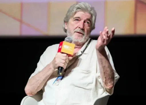 Photo of Mihály Víg speaking at a masterclass.