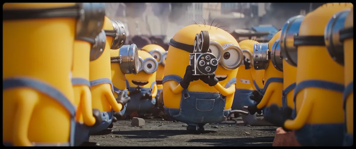 A Minion character from 'Minions & Monsters' looking mischievous and happy.