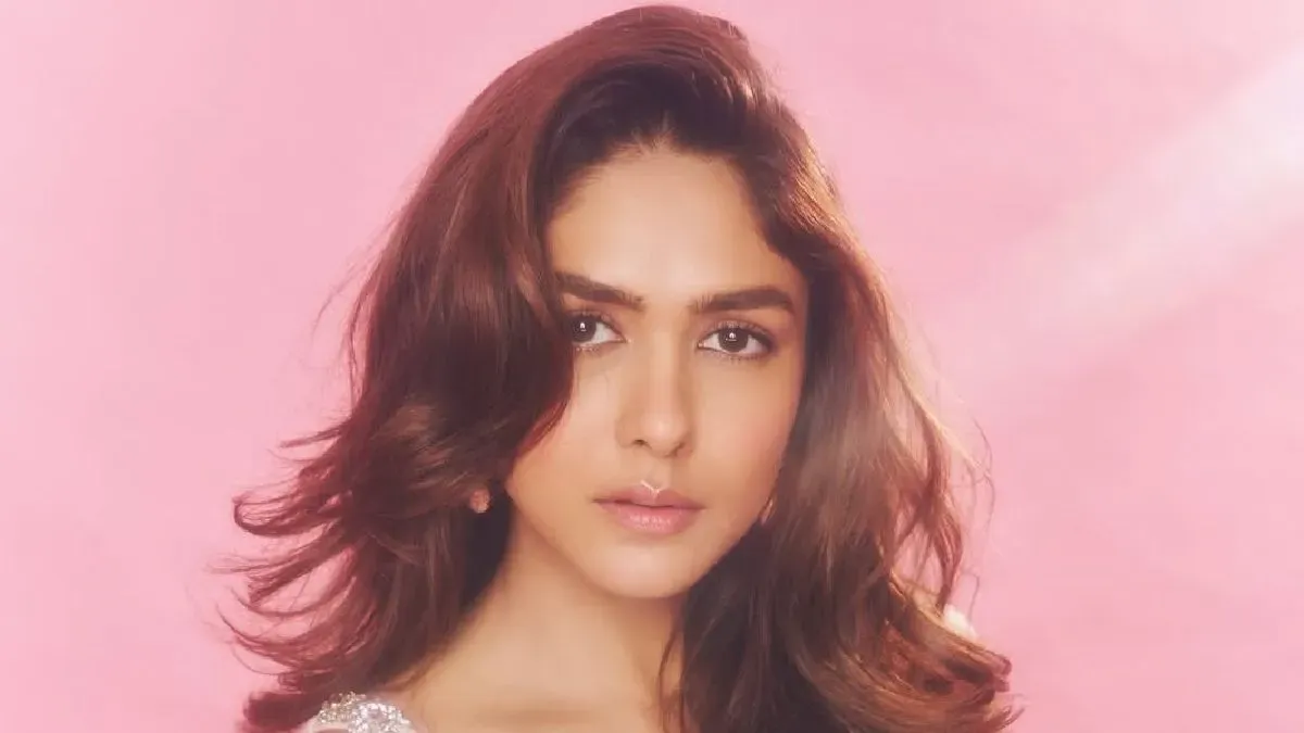 Mrunal Thakur smiling confidently, ready for her diverse new movie roles.