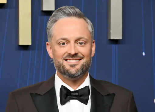 Nate Bargatze standing near Donald Trump at a UFC event.
