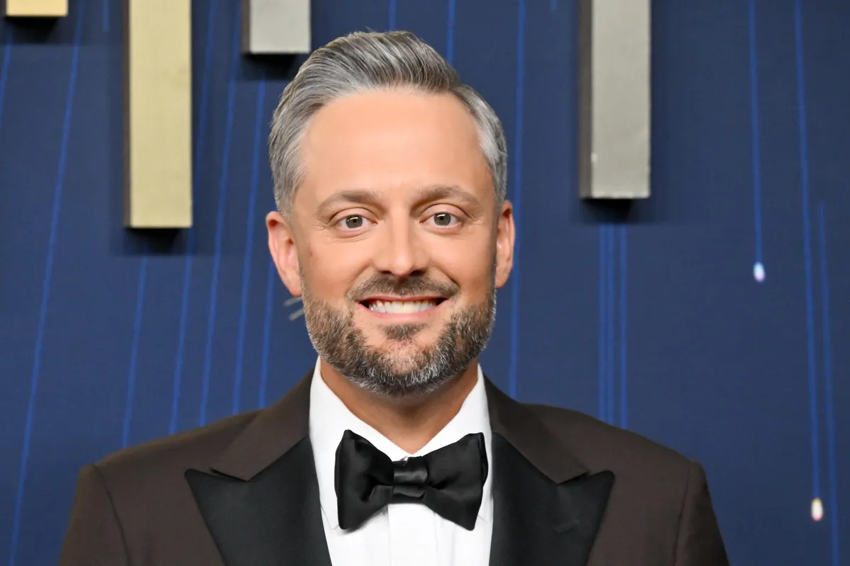 Nate Bargatze standing near Donald Trump at a UFC event.