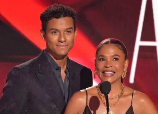 Nia Long and Jaafar Jackson on stage at the BET Awards, smiling and holding an award.