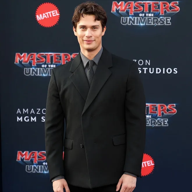 Nicholas Galitzine as He-Man, looking powerful with the Sword of Grayskull.