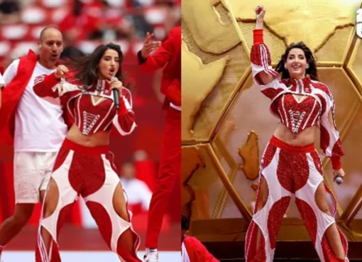 Nora Fatehi performing on a brightly lit stage at a sporting event.