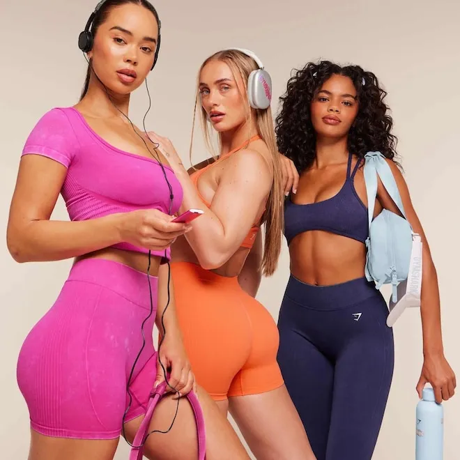 Image of Bratz characters in Gymshark activewear, showcasing bold colors and sporty style.