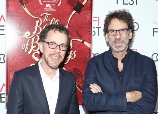 Joel and Ethan Coen smiling together warmly.