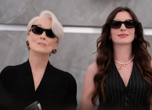 Still image from The Devil Wears Prada 2 showing a character in a stylish, powerful outfit.