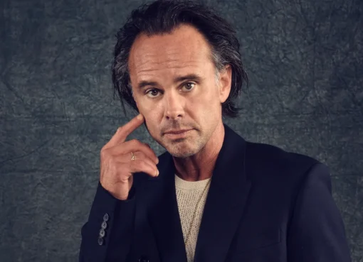 Walton Goggins in a heroic pose, looking thoughtful.