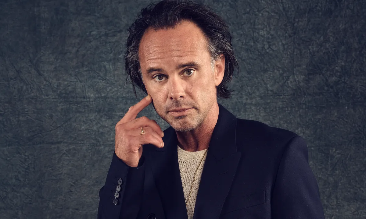 Walton Goggins in a heroic pose, looking thoughtful.