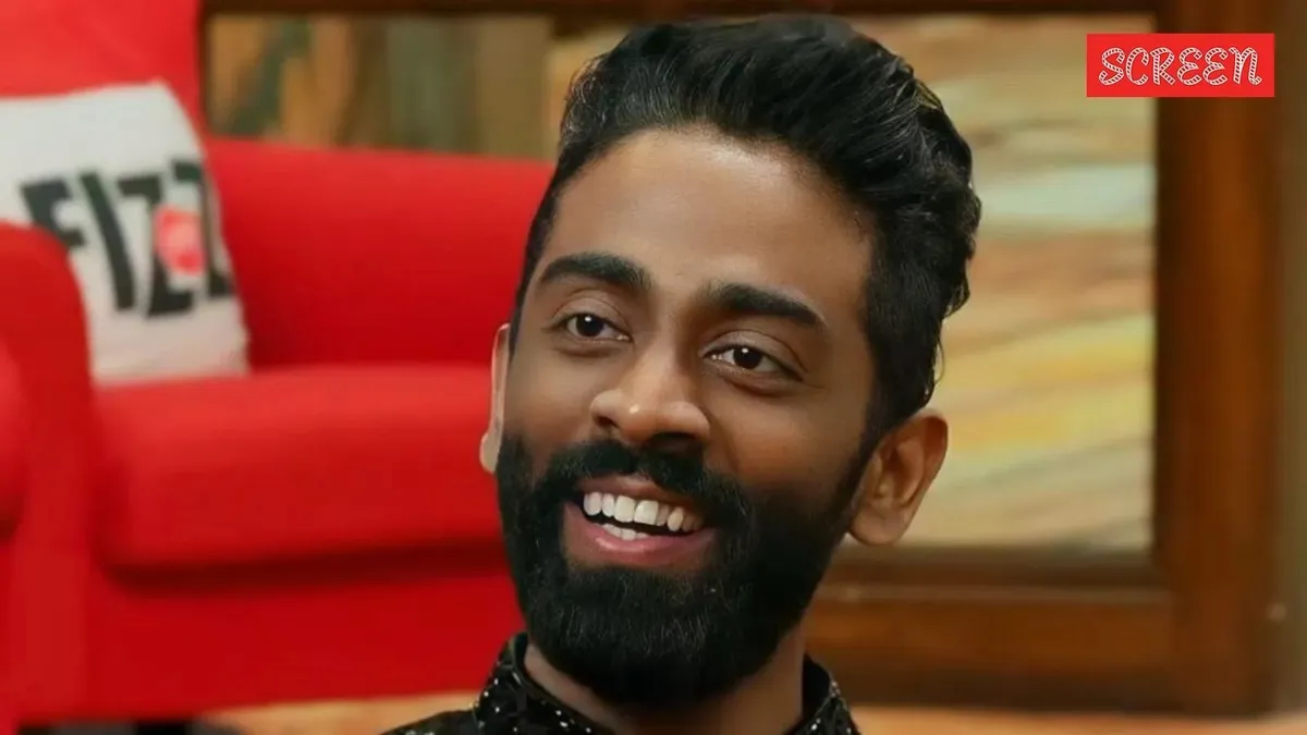 Pranit More looking apologetic in a video, with a graphic image of biryani in the background.