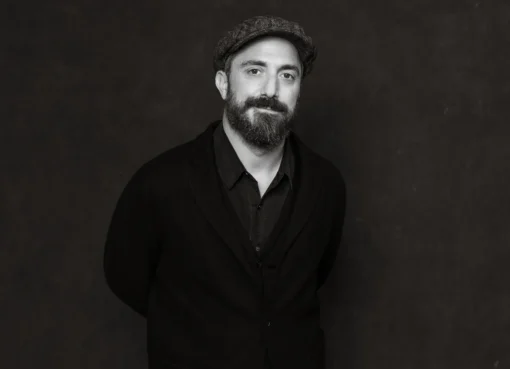 A close-up portrait of Chilean filmmaker Pablo Larraín.