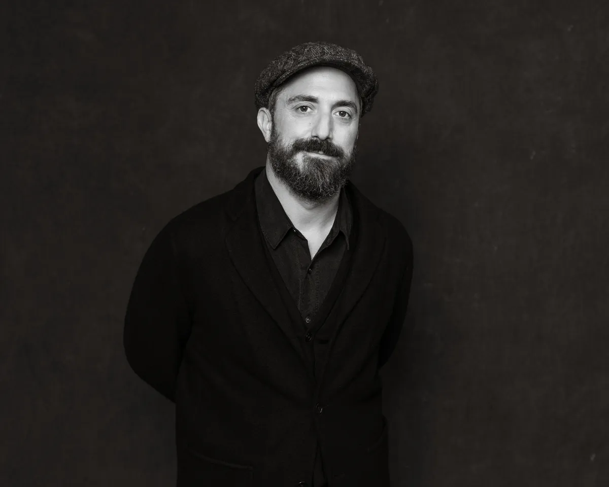 A close-up portrait of Chilean filmmaker Pablo Larraín.