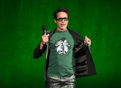 Robert Downey Jr. smiling and looking confident at an event.