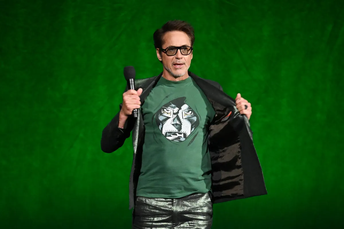 Robert Downey Jr. smiling and looking confident at an event.