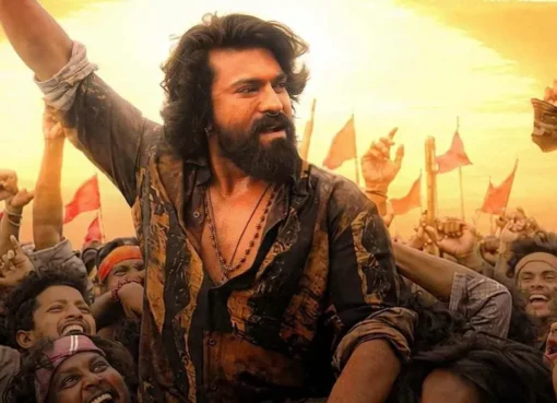Ram Charan in a dramatic movie still, looking determined
