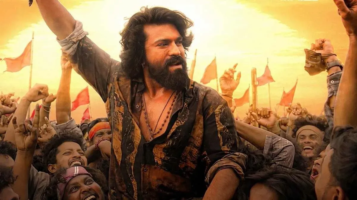 Ram Charan in a dramatic movie still, looking determined