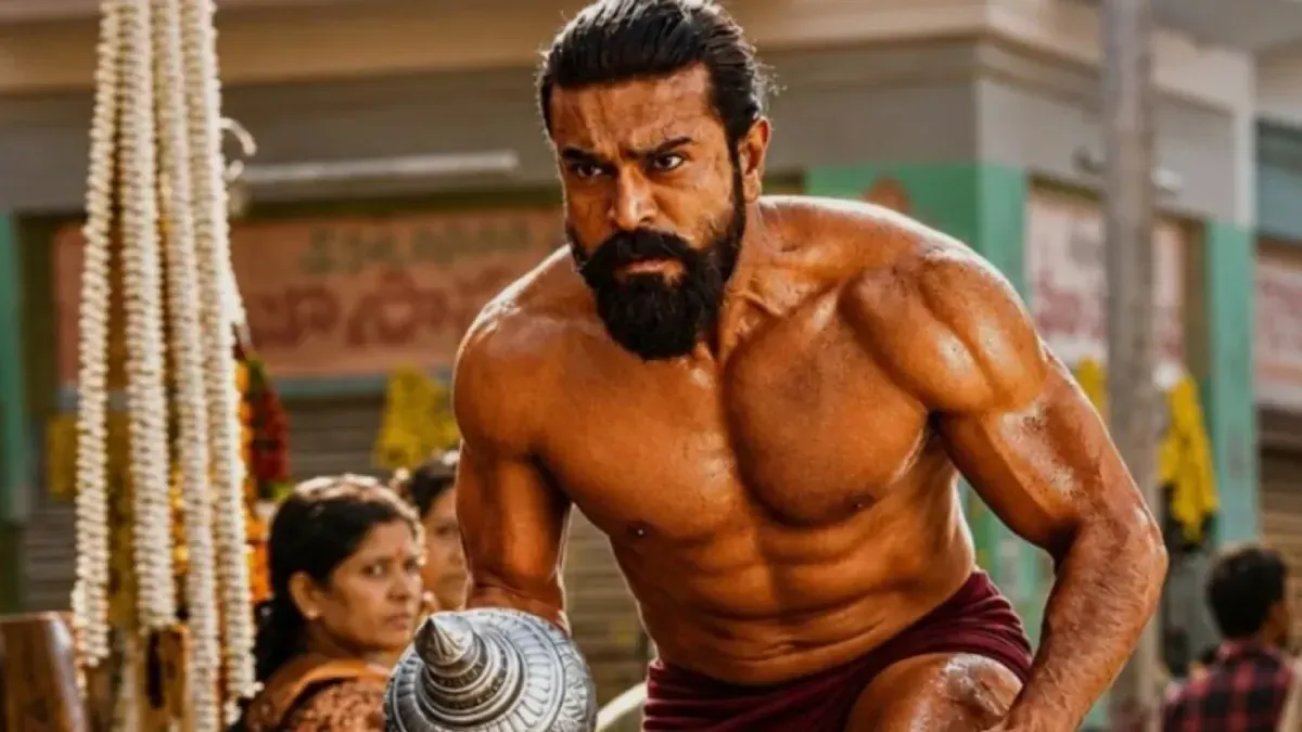 Split image showing Ram Charan looking intense on one side and Varun Dhawan smiling on the other, representing a box office clash.