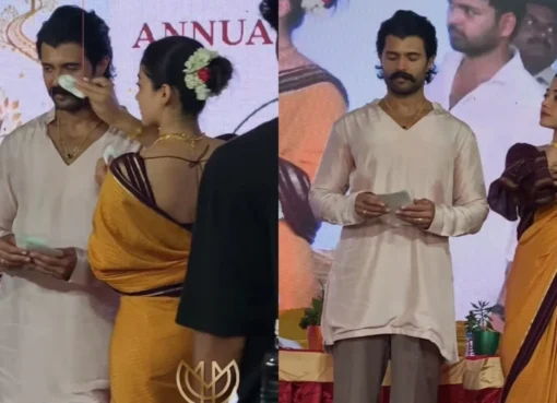 Rashmika Mandanna gently fixing Vijay Deverakonda's moustache.