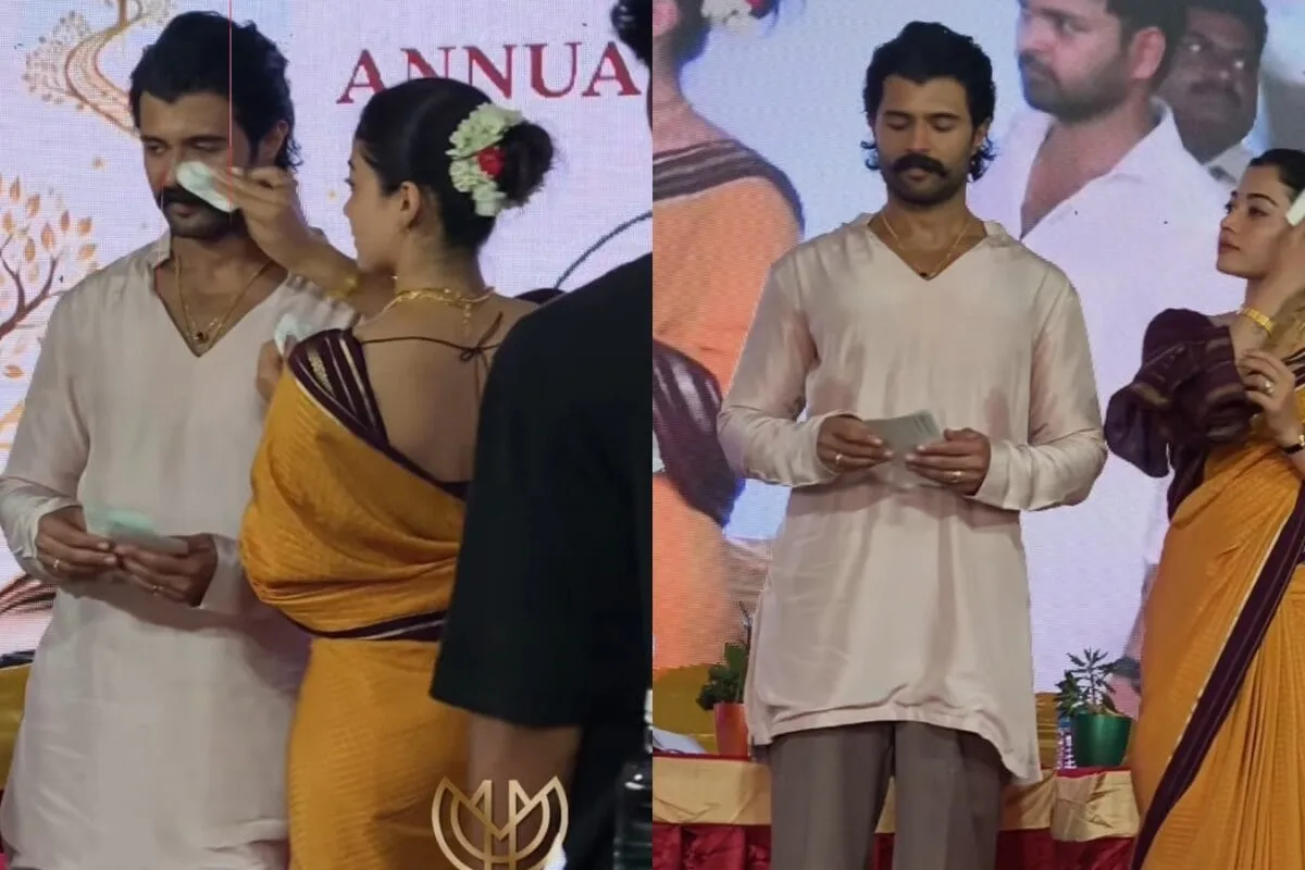 Rashmika Mandanna gently fixing Vijay Deverakonda's moustache.