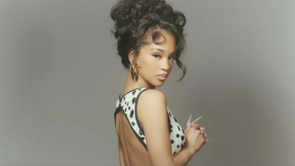 Rapper Saweetie smiling