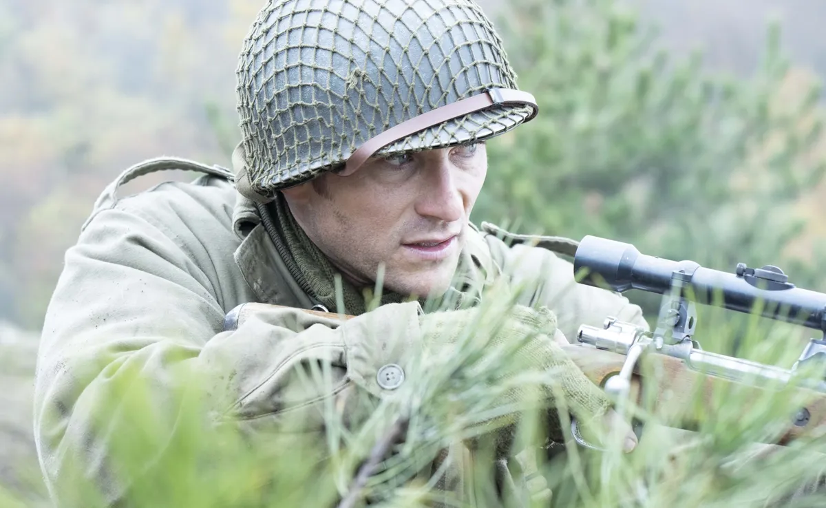Scott Eastwood looking determined and dirty in a scene from the movie Lucky Strike.
