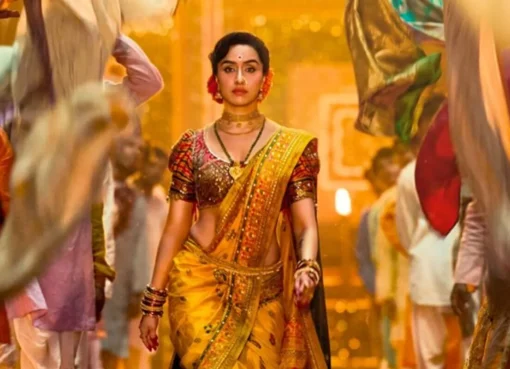 Shraddha Kapoor in a traditional Lavani dancer costume, looking intense.