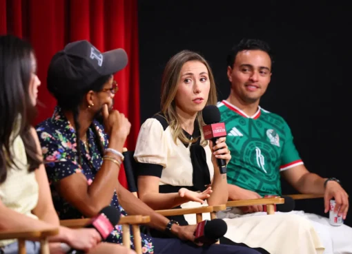 Young actors smiling at a press event, discussing their careers.