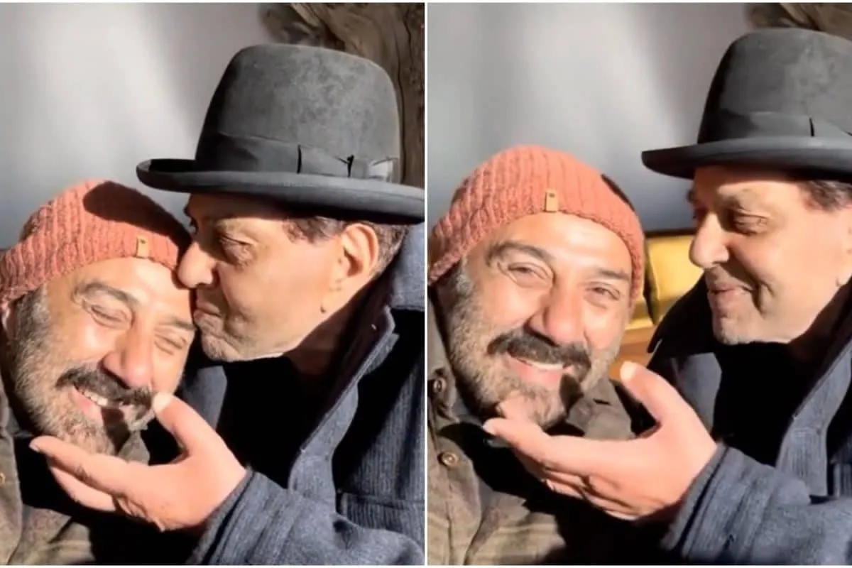 Sunny Deol and Dharmendra smiling together in a throwback style photo