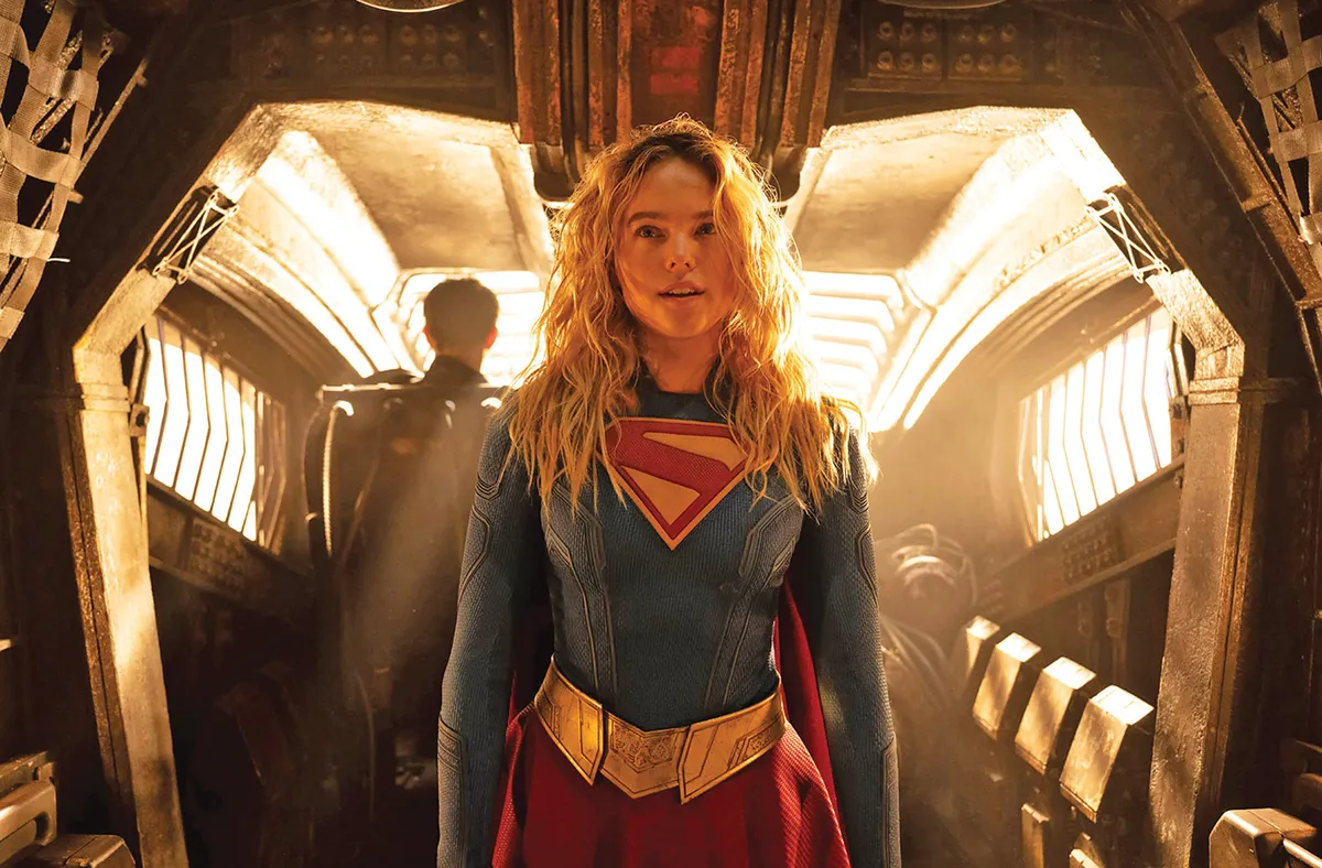 Supergirl character flying and Toy Story characters smiling.