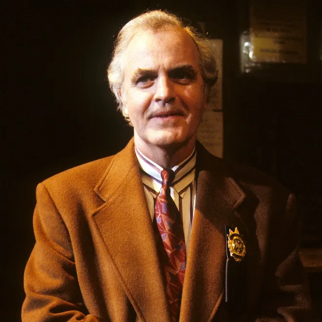 Actor James Handy in a movie scene.