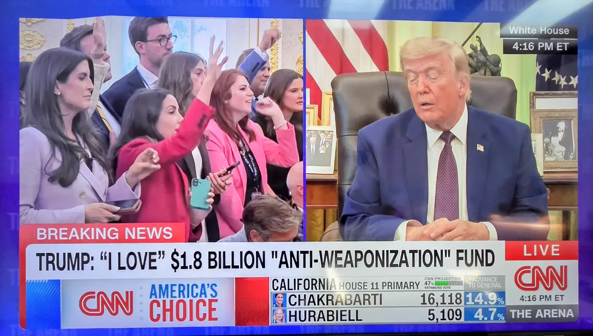 President Donald Trump speaking to reporters in the Oval Office.