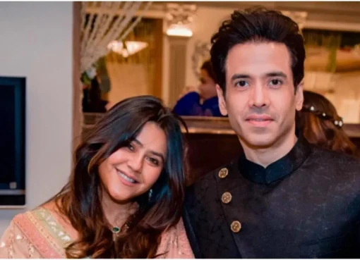 Tusshar Kapoor and Ekta Kapoor smiling.