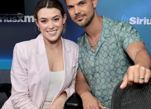 Taylor Lautner and Tay Lautner smiling, holding items related to their baby's sex reveal.