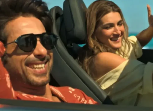 Shahid Kapoor and Kriti Sanon smiling and posing at a movie event.