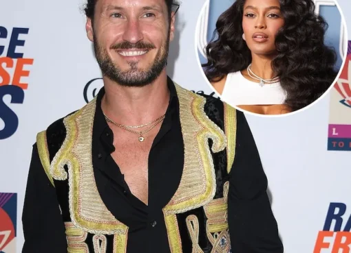 Val Chmerkovskiy smiling on a dance floor