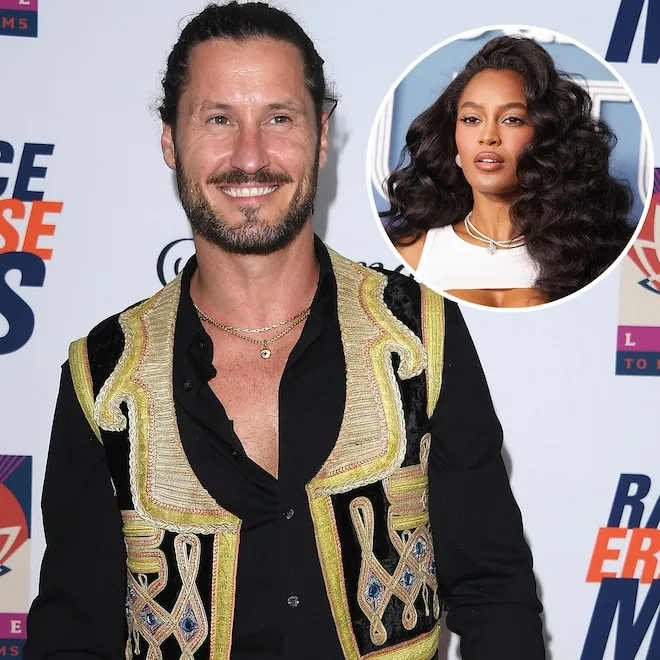 Val Chmerkovskiy smiling on a dance floor