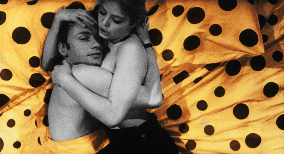 Promotional image for the 1967 film Deadly Sweet, featuring its lead actors Jean-Louis Trintignant and Ewa Aulin in a stylish, pop art aesthetic.