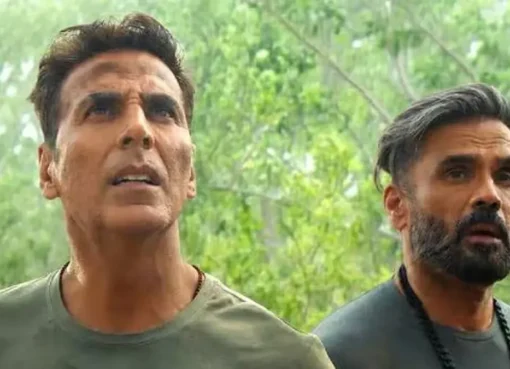 Akshay Kumar smiling in a vibrant jungle setting from the Welcome To The Jungle movie poster.